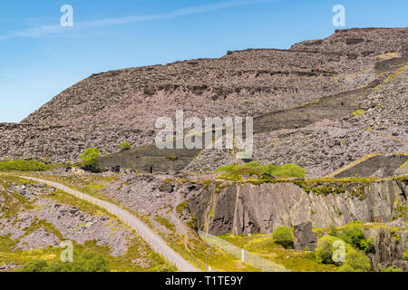 Walking in the derelict Dinorwic Quarry near Llanberis, Gwynedd, Wales, UK Stock Photo