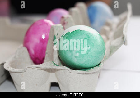 Painted eggs. Paint the eggs for Easter. Marble colored eggs. Pastel shades. Easter eggs. Stock Photo