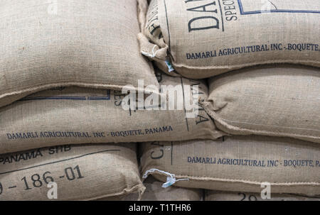 coffee beans packed in jute bags for export Stock Photo