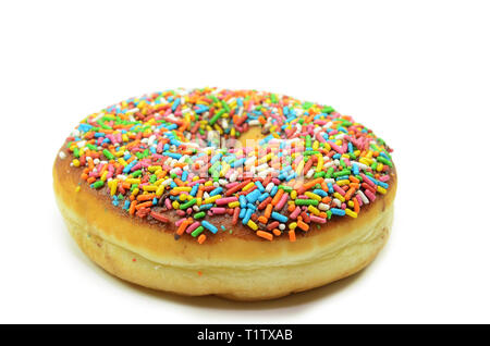 Sweet donut with rainbow candy sprinkles on top Stock Photo