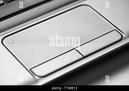 Laptop touchpad and buttons, macro photo. Stock Photo