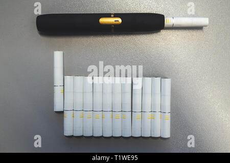 Download Tobacco Heating System And A Pack Of Tobacco Sticks On A Gray Background Stock Photo Alamy PSD Mockup Templates
