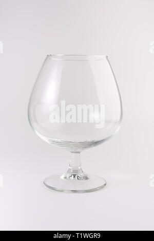 Single empty brandy glass Stock Photo