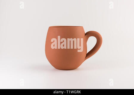 Empty unpainted clay pot isolated on white Stock Photo