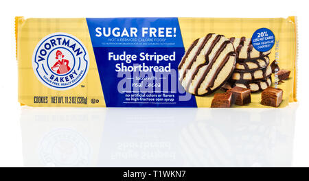 Winneconne, WI - 24 March 2019: A package of  Voortman baker fudge striped shortbread on an isolated background Stock Photo