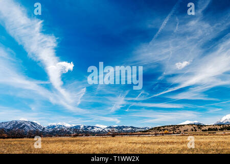 Unusual cloud formations against cobalt blue sky over Rocky Mountains; central Colorado; USA Stock Photo