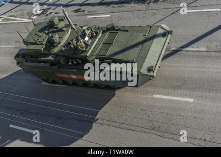 May 9, 2015. Heavy infantry fighting vehicle T-15 Armata returns from Red Square after the Victory Parade, top-back view. Stock Photo