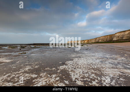 Chalk wave cut platform at Pam Bay, Margate, Kent, UK during a March afternoon. Stock Photo