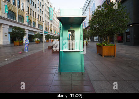 Shanghai, China - 08 12 2016: Green telephone booth also called phone booth, telephone kiosk, telephone call box, telephone box or public call box in Stock Photo