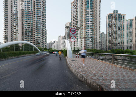 A bridge and some modern buildings in Putuo district over the Wusong river. Residential skyscrapers in Shanghai, China Stock Photo