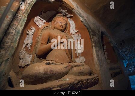 A Buddha statue in Mati Si temple, also called Horse's Hoof Temple in the rock caves, Sunan, Zhangye, Gansu, China