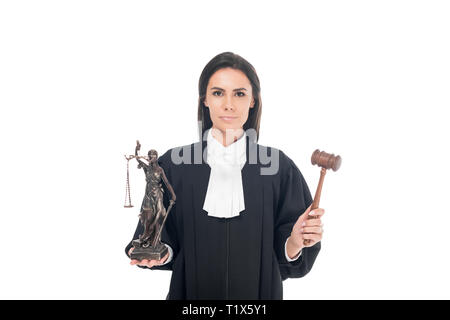 Judge in judicial robe holding gavel and themis figurine isolated on white Stock Photo