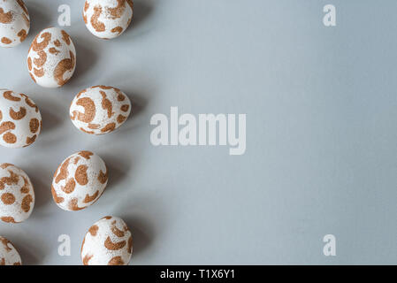 Stylish background with white easter eggs with copy space for text. Easter concept. Stock Photo