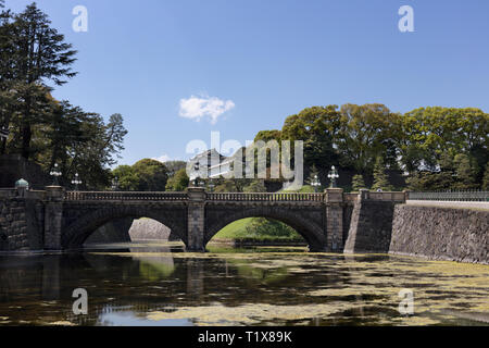 Tokyo, Japan - April 2017: Bridge over the moat at the Imperial Palace in Chiyoda Stock Photo