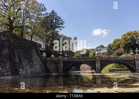 Tokyo, Japan - April 2017: Bridge over the moat at the Imperial Palace in Chiyoda Stock Photo