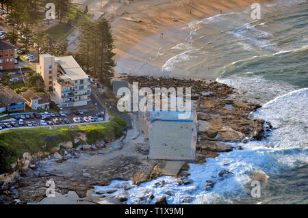 An aerial view of Dee Why ocean swimming pool in Sydneys ocean suburbs, New South Wales, Australia. These are traditional pools with few remaining. Stock Photo