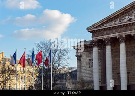 Paris: French and Chinese flags in the wind in front of National Assembly Stock Photo