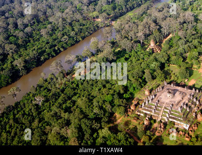 An aerial view of a small ruined temple in the jungle, near Angkor Thom, Cambodia. Stock Photo