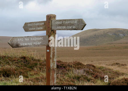 Wooden direction signs on bogland walk at the Wild Nephin National Park in County Mayo Ireland. Stock Photo