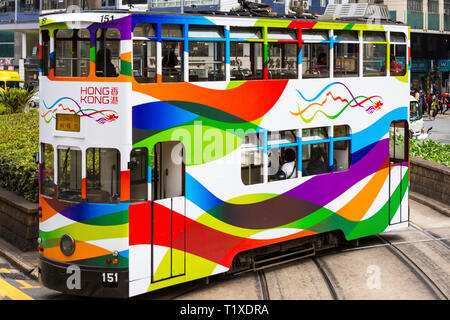 Tram turning at junction, Causeway Bay, Hong Kong, SAR, China Stock Photo