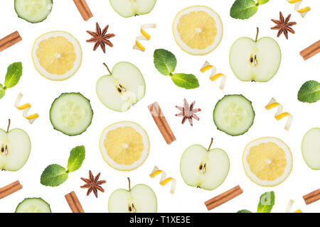 Seamless pattern Slice of green Apple, cucumber and lemon. Lemon peel chips cinnamon and anise isolated on white Stock Photo