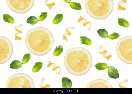 Seamless pattern of Round slices of lemon, shavings of lemon zest and mint leaves on a white background. Isolate Stock Photo