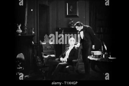 Dr. Jekyll and Mr. Hyde (1920 Paramount film) dr jeckyl and mr hyde vintage screenshot Stock Photo