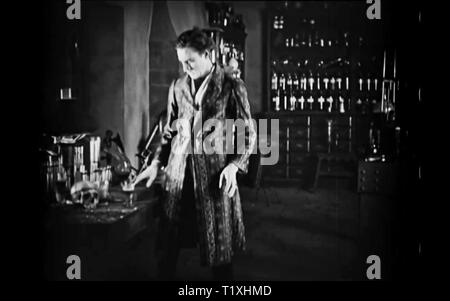 Dr. Jekyll and Mr. Hyde (1920 Paramount film) dr jeckyl and mr hyde vintage screenshot Stock Photo