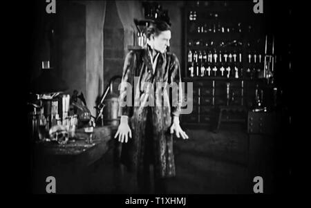 Dr. Jekyll and Mr. Hyde (1920 Paramount film) dr jeckyl and mr hyde vintage screenshot Stock Photo