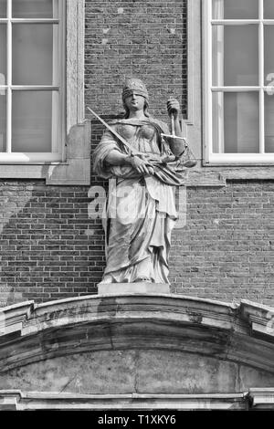 Lady Justice, goddess of Justice. Her blindfold stands for objectivity, balance in left hand weighing of evidence, sword in her right hand punishment. Stock Photo