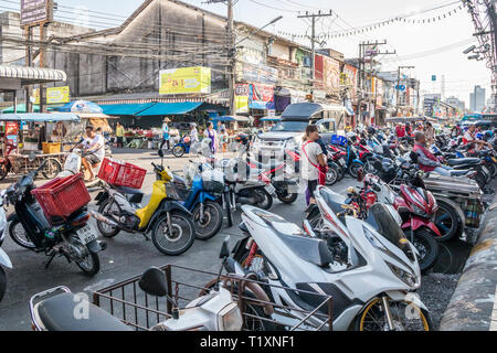 Phuket, Thailand 21st January 2019: Motorcycles parked outside the market in Phuket Town. The daily market is busy in the mornings. Stock Photo