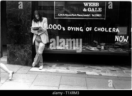 An Oxfam temporary shop in a closed store in Rotherham, South Yorkshire, UK, in 1970 as the charity responded to the famine and cholera in Bangladesh. Stock Photo