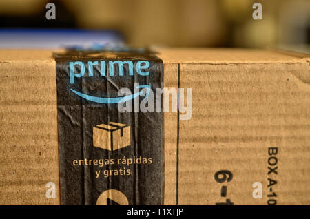 Turin, Piedmont, Italy. March 2019. An Amazon package was delivered. Close-up with selective focus on the blue Amazon Prime service logo and the arrow Stock Photo