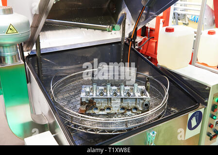 Automatic washing system for engine parts and assemblies Stock Photo