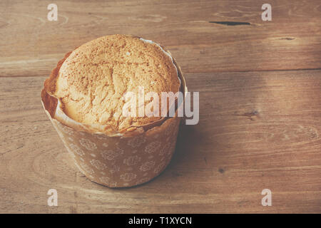 Homemade egg cupcake put on left of wooden table Stock Photo