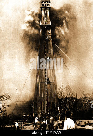 Rumanian Oil industry -Circa 1930's - A  rare photograph of a hand-dug petroleum bore-hole in Rumania, encased in wood and secured with guy ropes(Romania was the largest European producer of oil in World War II. Later in 1943 installations were bombed by the USA in 'Operation Tidal Wave' Stock Photo