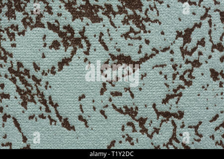 Extravagant mottled fabric texture in light tone. Stock Photo