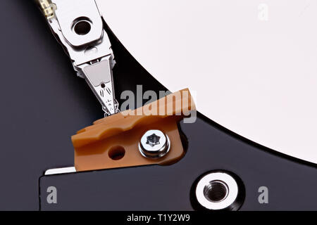 Detail of opened hard disk drive. Stacked photo. Stock Photo