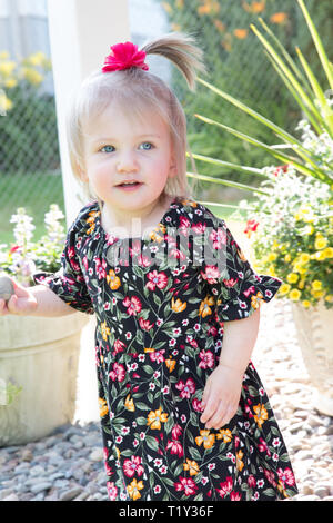Happy one and a half year old toddler outside, USA Stock Photo
