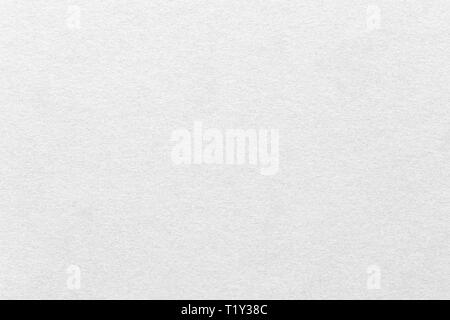 Handmade striped embossed silver paper. High quality white paper background. Stock Photo