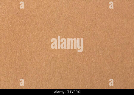 Background with brown felt texture. Felt material on macro. Stock Photo