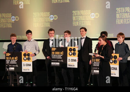 Prague, Czech Republic. 28th Mar, 2019. Winners of the school team category in 'You're the filmmaker' competition receive prizes on stage during the 26th Prague International Film Festival in Prague, the Czech Republic, March 28, 2019. The closing ceremony of the film festival was held here Thursday night. Credit: Dana Kesnerova/Xinhua/Alamy Live News Stock Photo