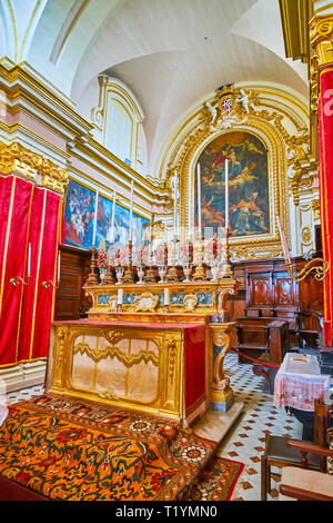 RABAT, MALTA - JUNE 16, 2018: Historical Grand Master Wignacourt Residence boasts preserved chapel with intricate decorations, icons and carved frnitu Stock Photo