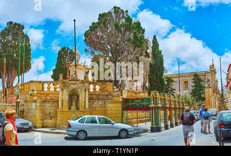 RABAT, MALTA - JUNE 16, 2018: The St Paul street is one of the main tourist routes, leading to the Parish church and lined with historical landmarks,  Stock Photo