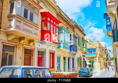 RABAT, MALTA - JUNE 16, 2018: The medieval town boasts well preserved examples of traditional Maltese architecture with colorful wooden balconies and  Stock Photo
