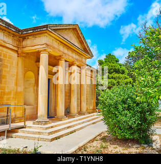 The stone porch with slender columns decorates the entrance to ancient Domus Romana - preserved ruins of Rman aristocratic house, located between Raba Stock Photo