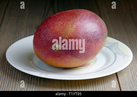 Mango on a table Stock Photo