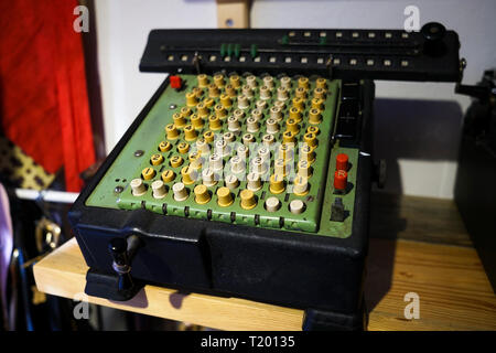 Antique green calculator in a museum Stock Photo