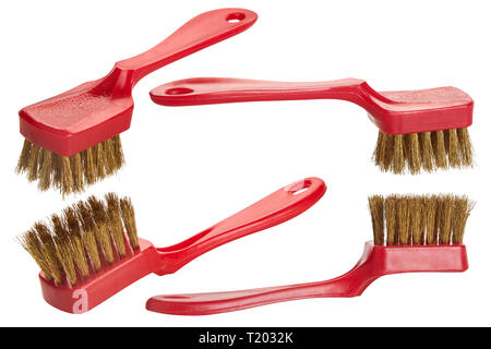 Metal brush for cleaning  with red plastic handle. Isolated Stock Photo