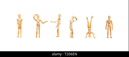 Many wooden mannequin doing differents gestures isolated on a white background Stock Photo